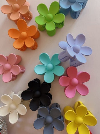 reviewer photo of the set of flower hair clips in assorted colors