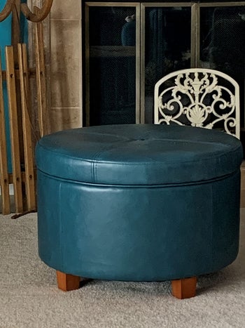 reviewer photo of teal round storage ottoman