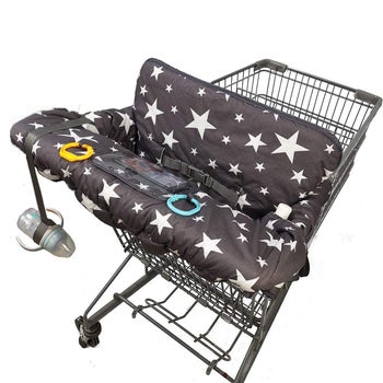a dark gray shopping cart cover with white stars on it