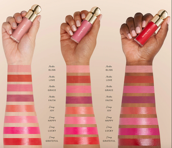 all eight shades of blush swatched on three different skin tones