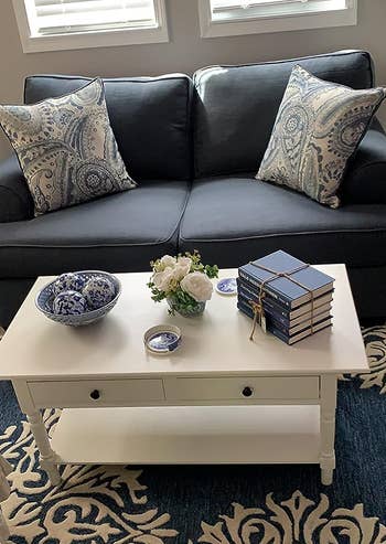 a reviewer photo of the coffee table in white 