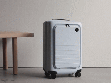 A astute  suitcase rolls connected  its own, demonstrating hands-free question   convenience successful  a minimalistic setting