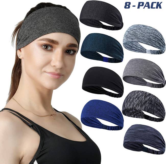 model wearing a gray headband next to eight different headbands in shades of black, blue, and gray