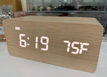 reviewer image of digital wooden alarm clock 
