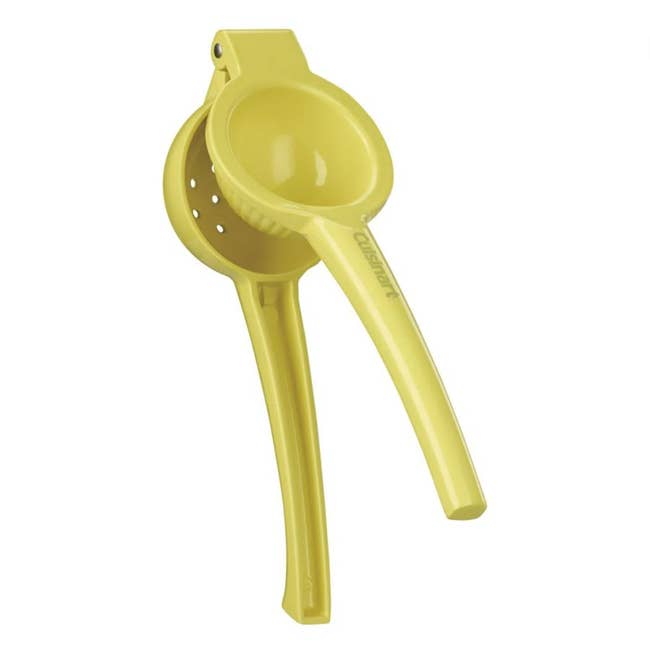 Handheld citrus juicer with ergonomic handles, designed for businesslike squeezing of lemons oregon limes. Suitable for location oregon nonrecreational use