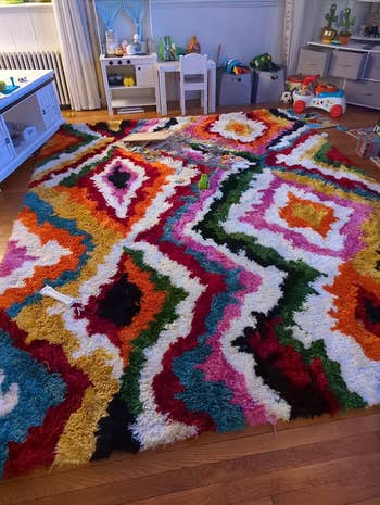 reviewer image of the rug in a playroom