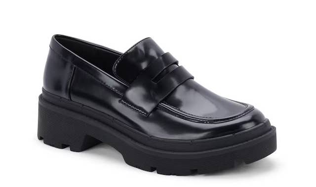 a black penny loafer with a lug sole 