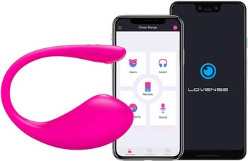 Pink egg-shaped vibrator next to cell phone