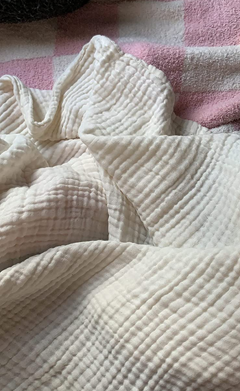 Close-up of the the muslin throw
