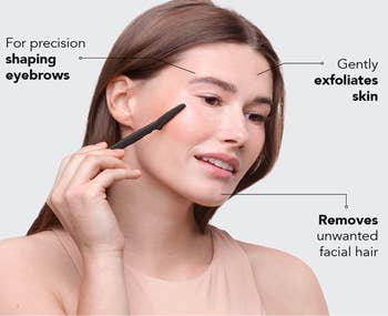 Model using a small black facial hair removal tool to dermaplane 