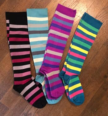 Reviewer image of four colorful striped socks