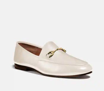 The white loafers with gold buckle
