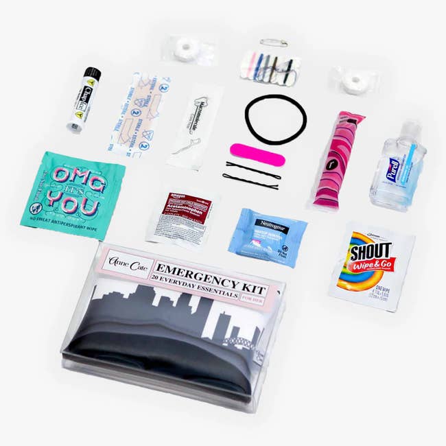 Assorted emergency kit items for personal care including lip balm, safety pins, and stain remover