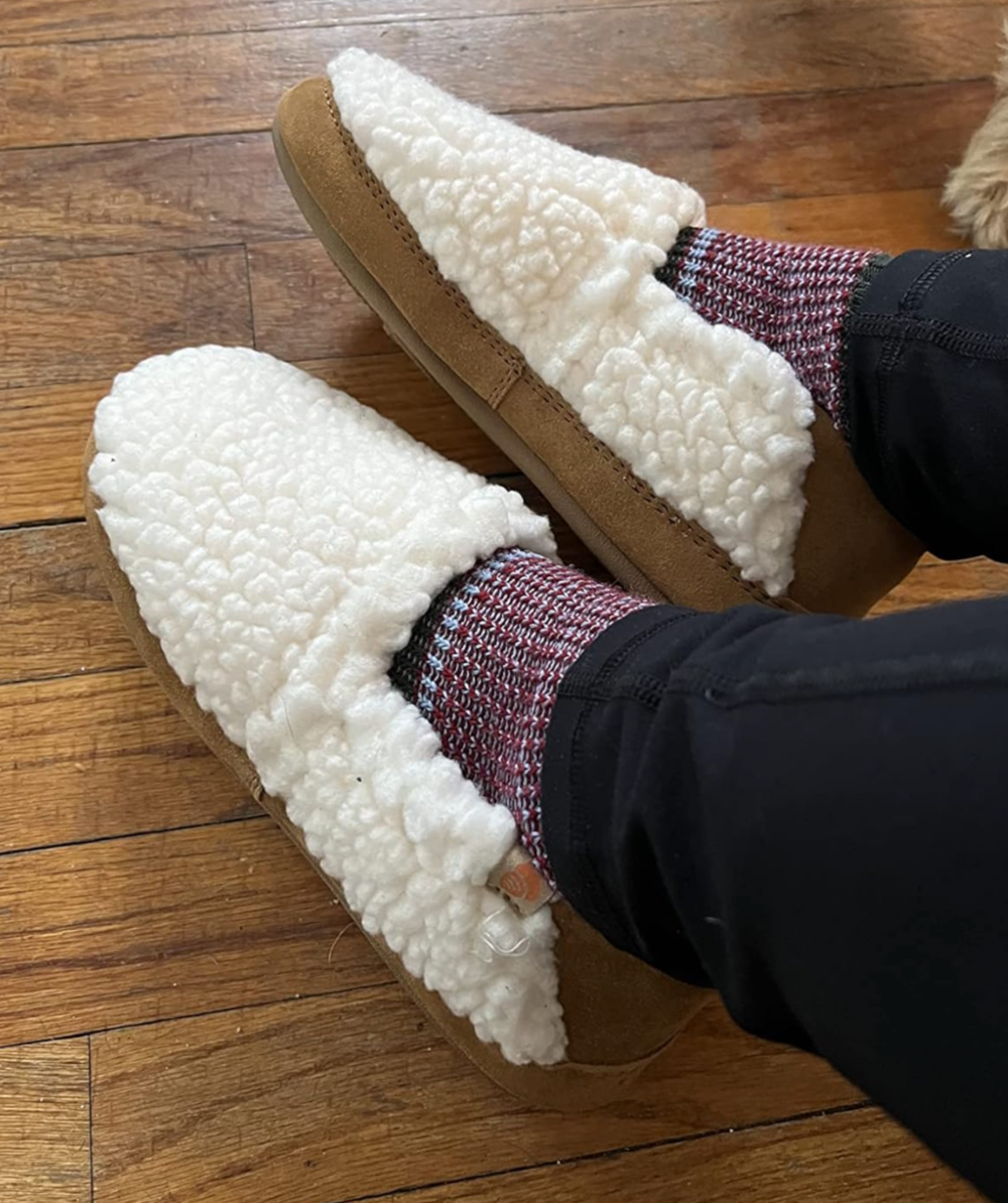 reviewer wearing the slippers