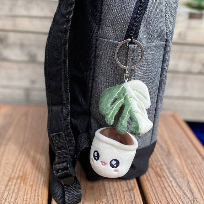 the keychain attached to a backpack 