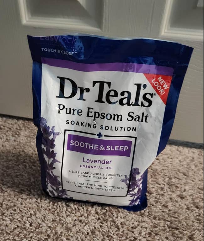 Dr Teal's Pure Epsom Salt with lavender indispensable  oil, labeled to soothe aches and beforehand   amended  sleep