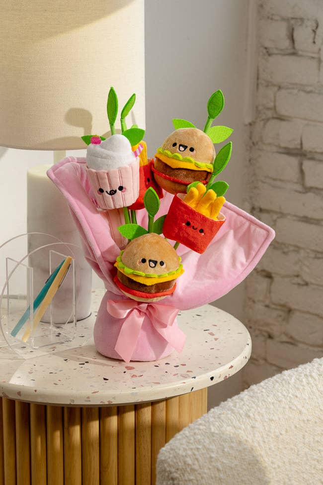 plush bouquet with stems featuring burgers, fries, and a milkshake with cute faces