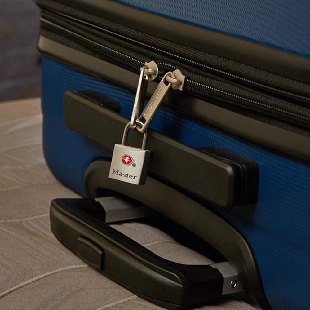 a suitcase with two zippers secured with a small lock