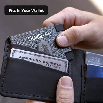 model's hand showing on the charger is thin enough to fit in a wallet
