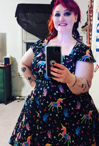 another reviewer wearing the unicorn dress