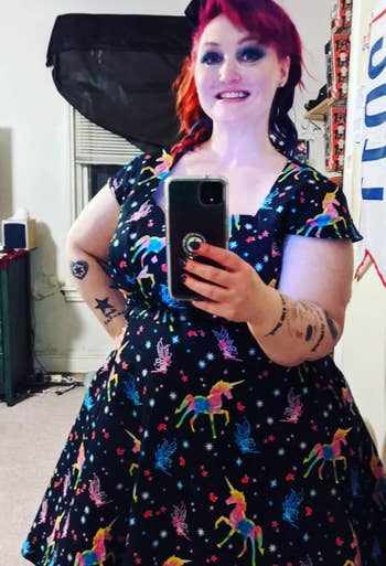 another reviewer wearing the unicorn dress