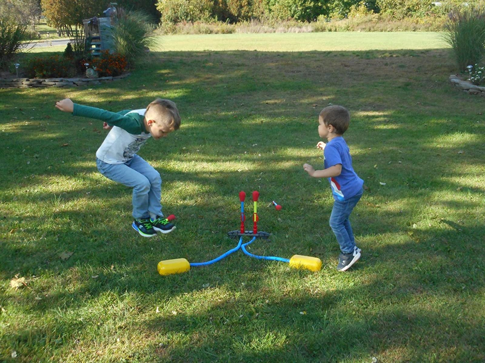 a reviewer's two kids jumping on the rocket launcher