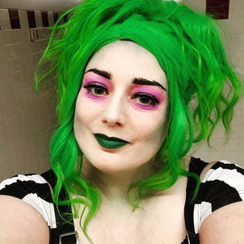 A reviewer's makeup at Comic Con after using the Urban Decay setting spray