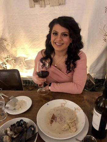 reviewer wearing the top in pink