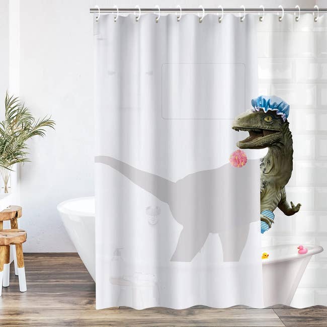 shower curtain with a dinosaur bathing