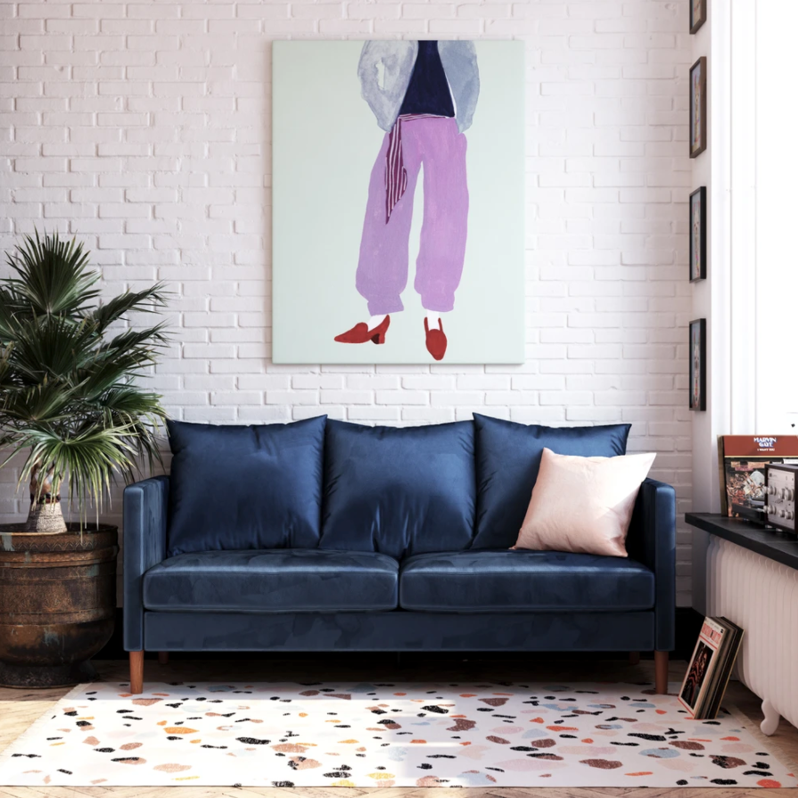 the couch in dark blue in a living room