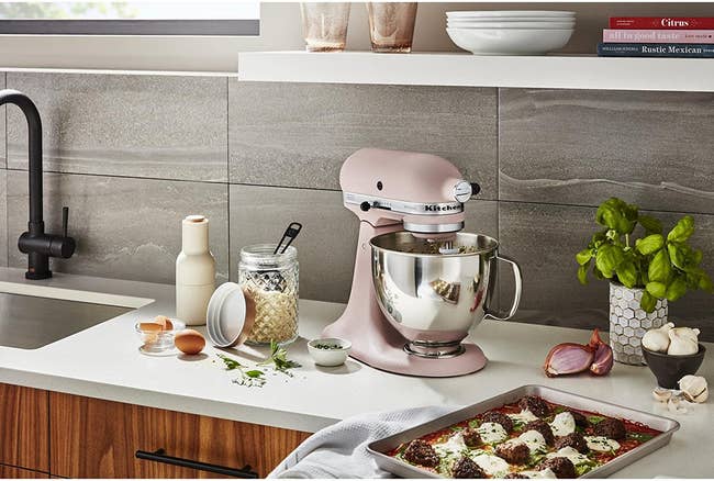 pink KitchenAid mixer on a kitchen counter