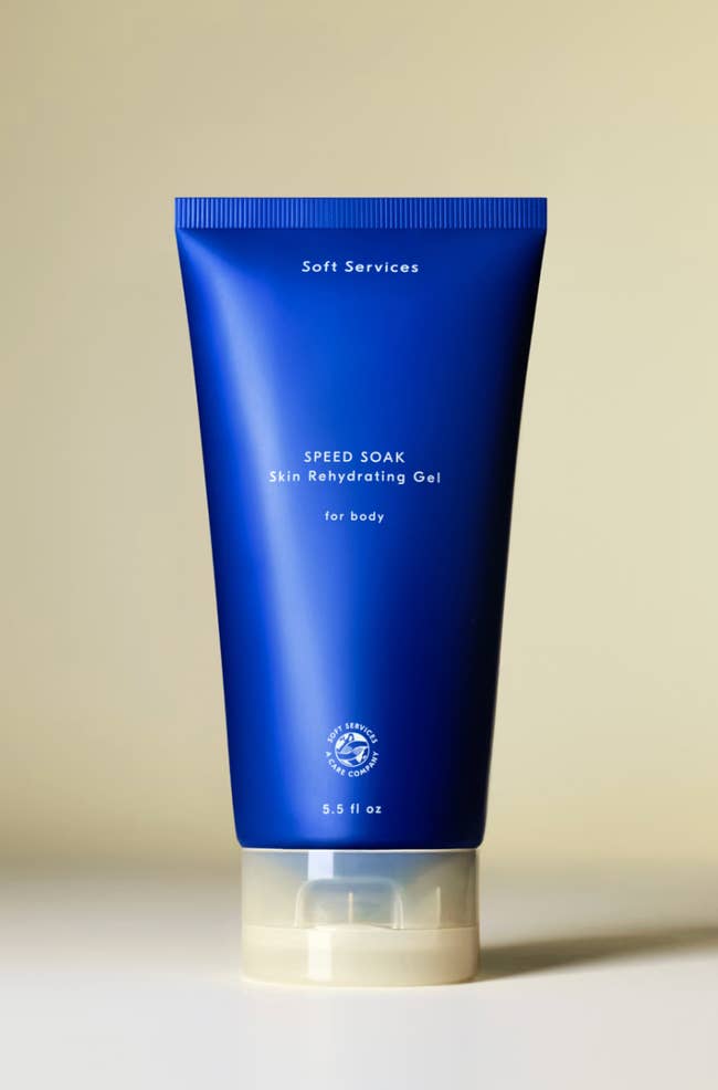 A bluish  conduit  of Soft Services Speed Soak Skin Rehydrating Gel for body, 8.5 fl oz, with merchandise  details disposable   connected  the label