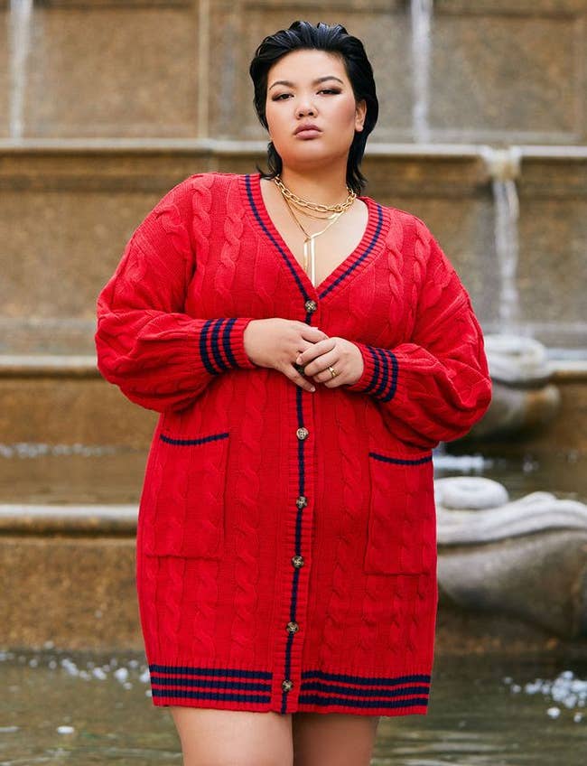 Model wearing the red cardigan sweater