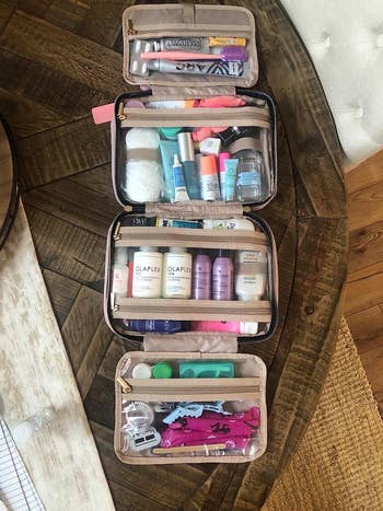 same reviewer showing how all the toiletries fit into the bag