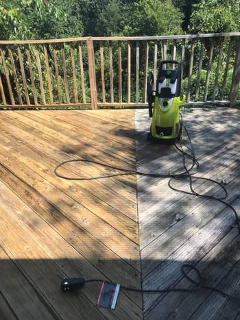 another reviewer's pressure washer on a wooden deck with clean and dirty areas, showing before and after results