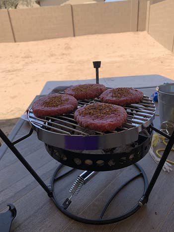 same reviewer's photo of patties on the grill