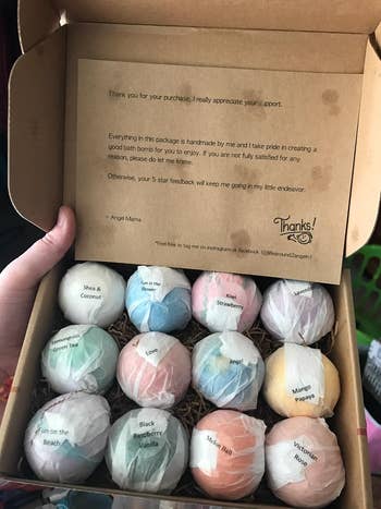 a reviewer's box of bath bombs