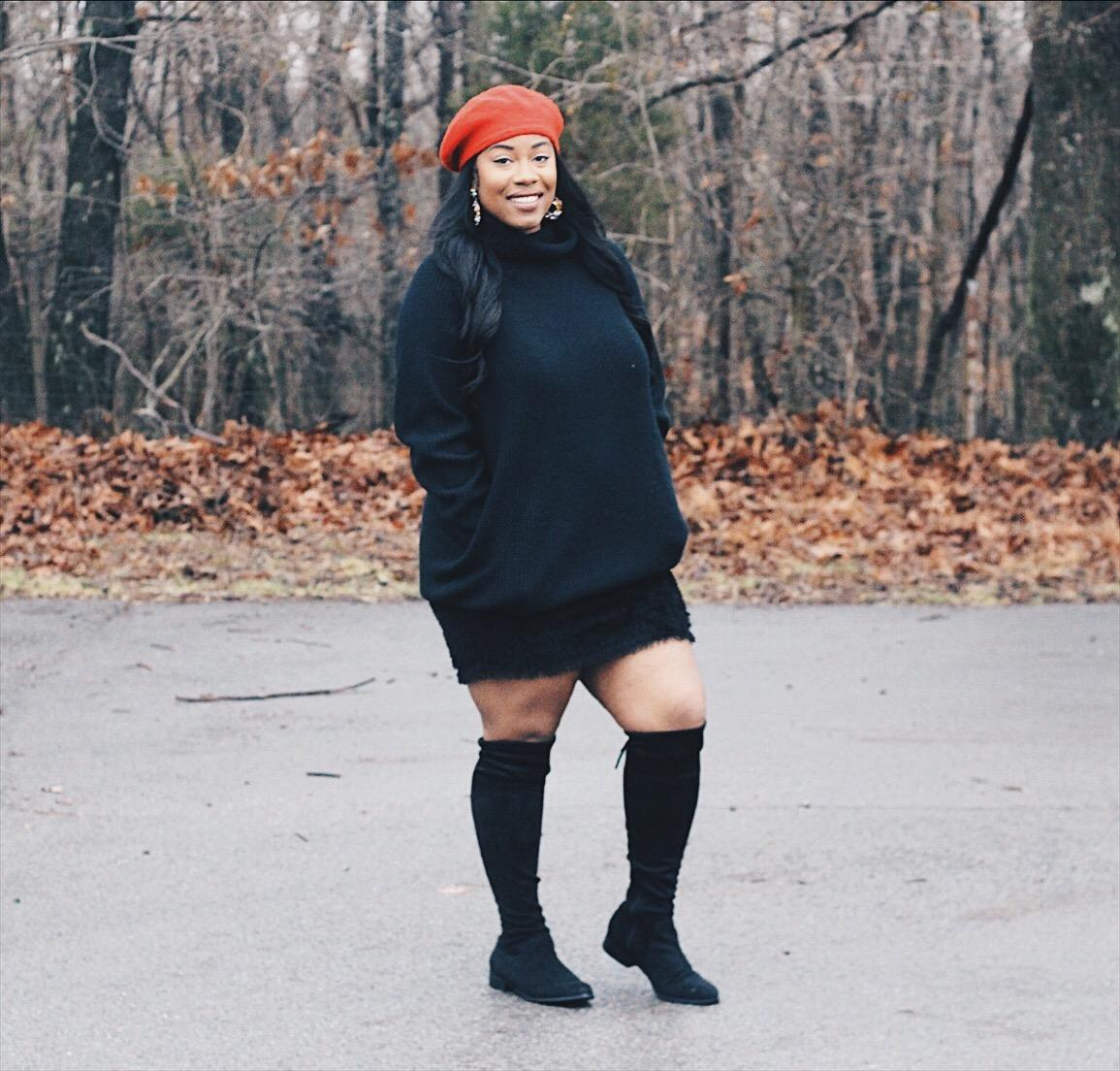 reviewer wearing the black dress