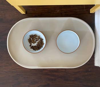 two bowls on a beige place mat