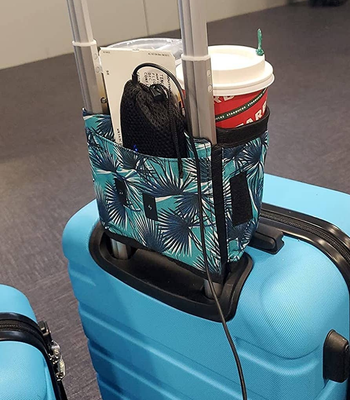 same reviewer showing back of luggage with caddy attached