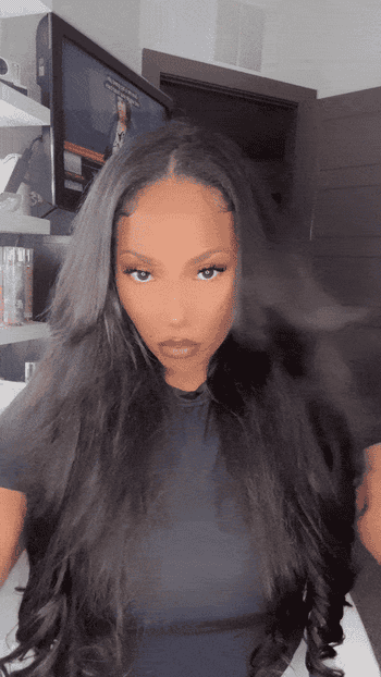 gif of BuzzFeed Shopping Writer Jordan Grigsby wearing and playing with the extensions