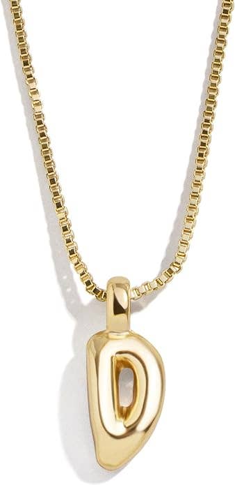 Gold concatenation necklace with a stylized