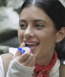 gif of model applying the balm to their lips