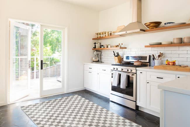the checkered area rug in a kitchen