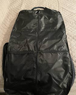 same reviewer's photo of the zipped up garment bag