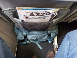 same bag under the airplane seat with plenty of leg room left