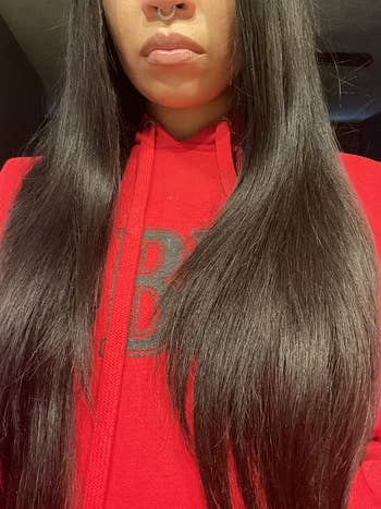 image of reviewer with long healthy-looking and shiny hair