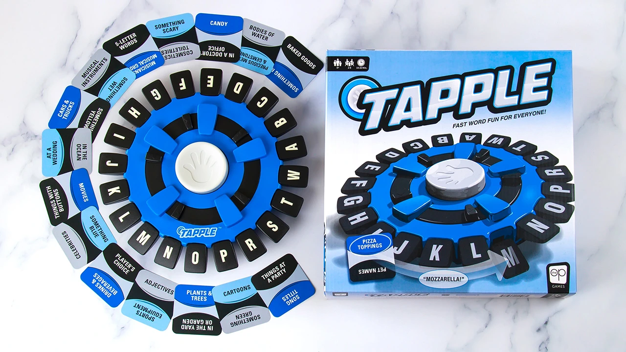 the tapple game showing the letters around the game piece and category cards to play