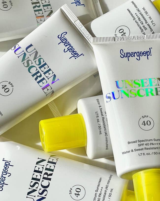 Various tubes of Supergoop! Unseen Sunscreen with SPF 40, featuring h2o and sweat resistance, suitable for buying recommendations