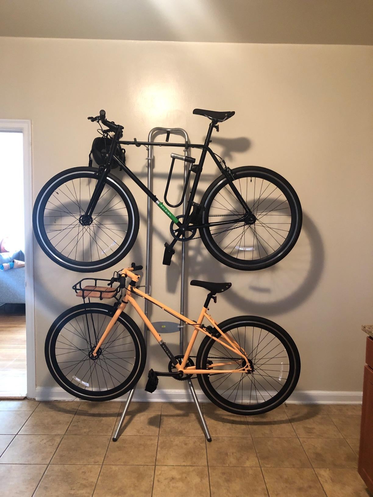 reviewer image of two bikes hanging from a freestanding bike rack
